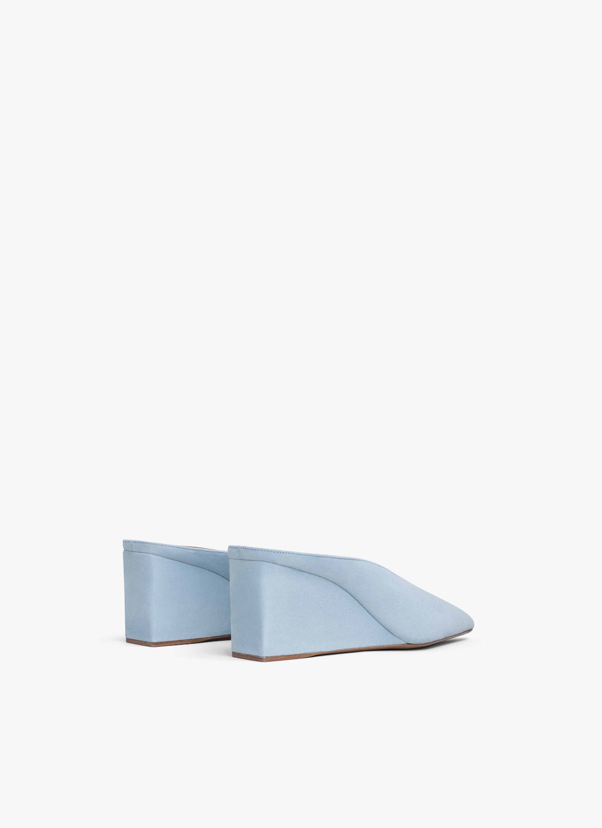 CUBE WEDGE MULES IN SUEDE GOATSKIN ALAÏA LIGHT BLUE CUBE WEDGE MULES IN SUEDE GOATSKIN